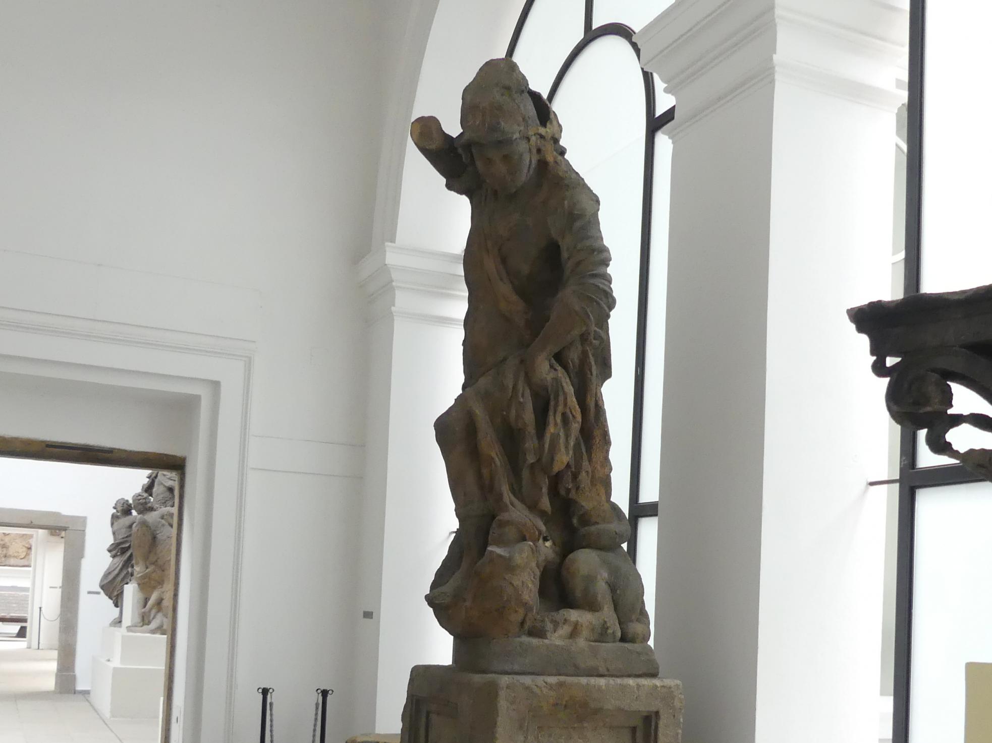 Johann Georg Bendl (1650–1680), Engel, der mit einem Drachen kämpft, Prag-Altstadt, Altstädter Ring, jetzt Prag-Holešovice, Lapidarium, Saal 5, 1650, Bild 2/3