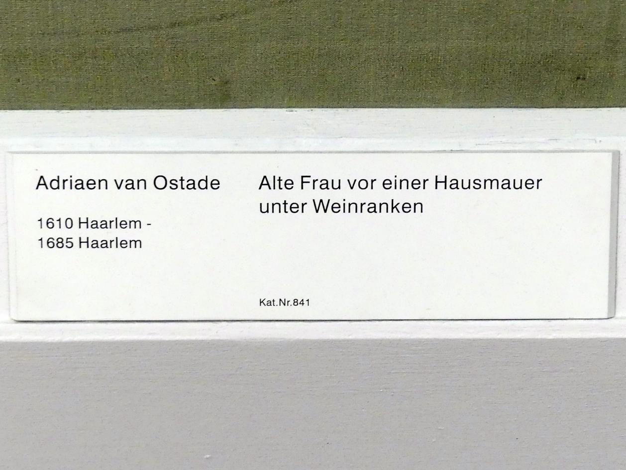Adriaen van Ostade (1635–1670), Alte Frau vor einer Hausmauer unter Weinranken, Berlin, Gemäldegalerie ("Berliner Wunder"), Kabinett 17, Undatiert, Bild 2/2