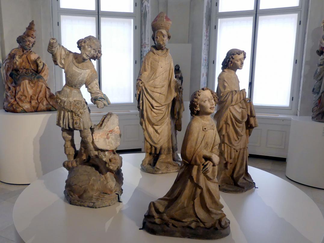 Meister von Großlobming (1395–1400), Kniender Engel einer Verkündigungsgruppe, Hl. Bischof, Hl. Johannes Evangelist, Hl. Georg mit dem Drachen, Großlobming, Pfarrkirche St. Lambert, jetzt Wien, Museum Oberes Belvedere, Saal 8, Ende 14. Jhd., Bild 3/9