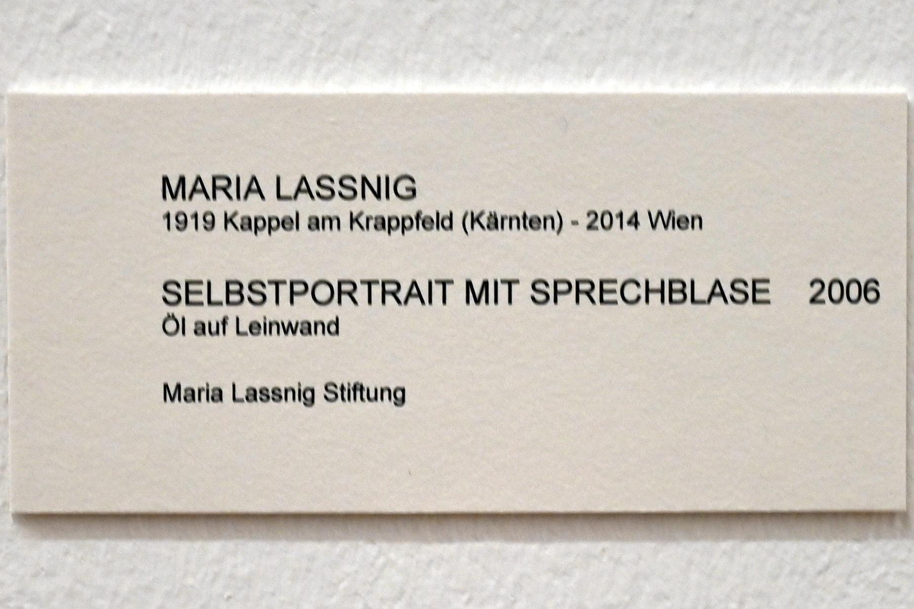 Maria Lassnig (1945–2011), Selbstportrait mit Sprechblase, Bonn, Kunstmuseum, Ausstellung "Maria Lassnig - Wach bleiben" vom 10.02. - 08.05.2022, Saal 1, 2006, Bild 2/2