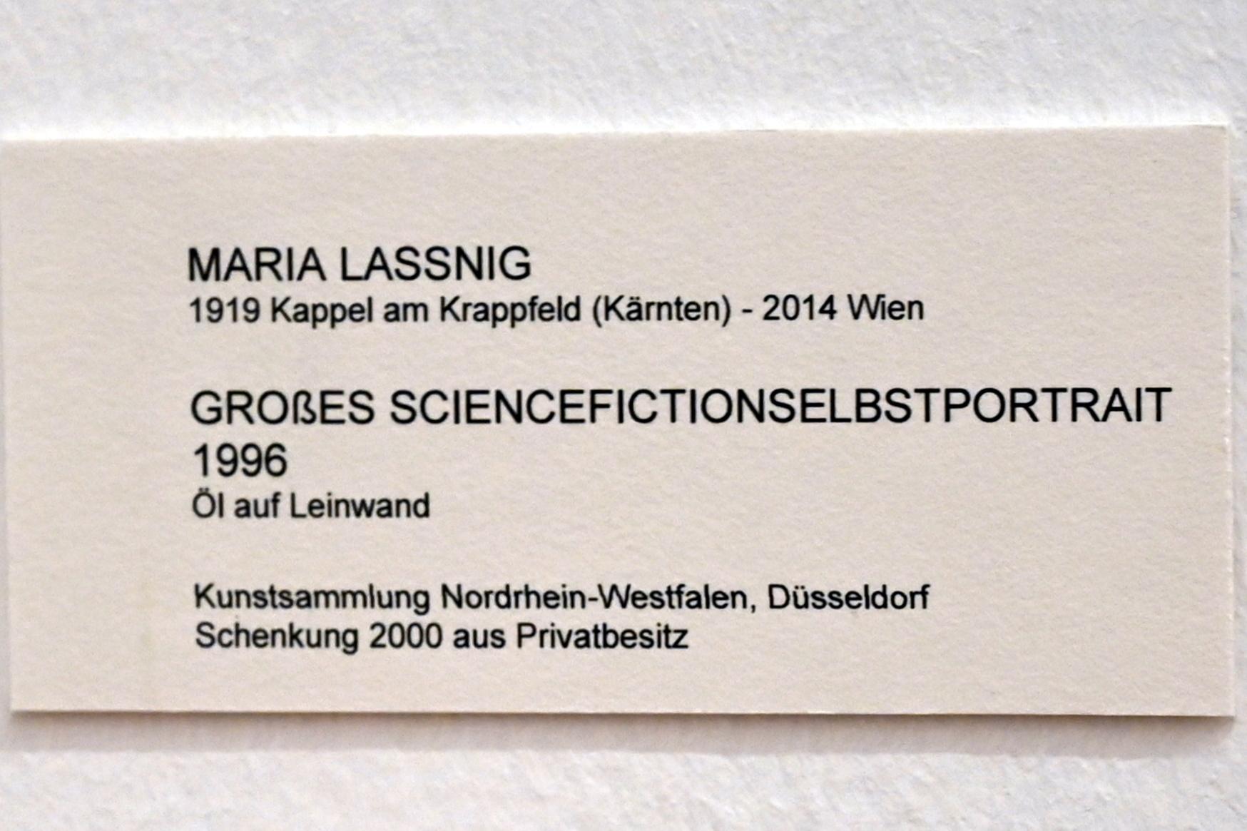 Maria Lassnig (1945–2011), Großes Sciencefictionselbstportrait, Bonn, Kunstmuseum, Ausstellung "Maria Lassnig - Wach bleiben" vom 10.02. - 08.05.2022, Saal 3, 1996, Bild 2/2