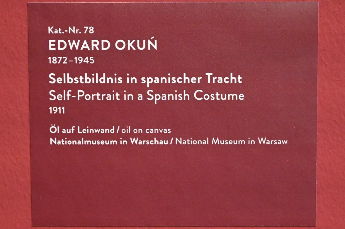 Edward Okuń (1911–1920), Selbstbildnis in spanischer Tracht, München, Kunsthalle, Ausstellung "Polnischer Symbolismus um 1900" vom 25.03.-07.08.2022, Saal 8 - Porträts, 1911, Bild 2/2