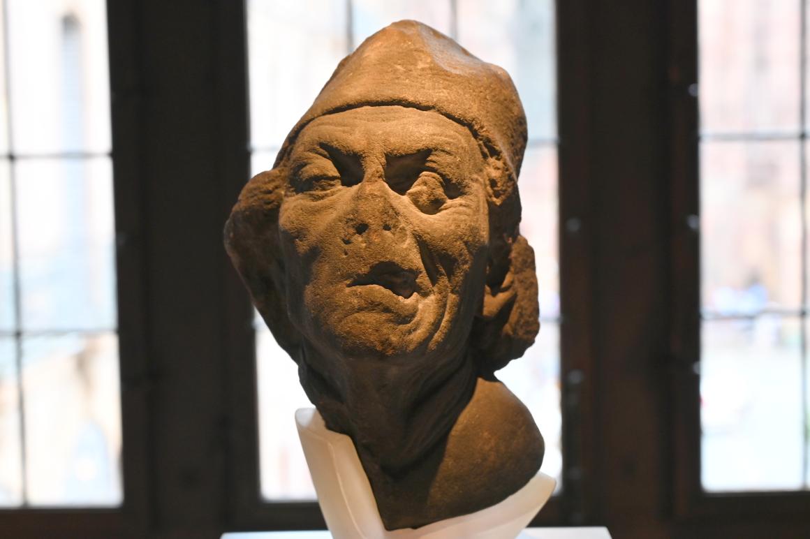 Nicolaus Gerhaert (Werkstatt) (1470), Männlicher Kopf mit Gesichtslähmung, Straßburg, Musée de l’Œuvre Notre-Dame (Frauenhausmuseum), um 1470, Bild 1/2